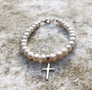 Small pearl and silver cross child’s bracelet