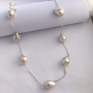 A large Baroque Pearl Necklace with Sterling Silver Chain